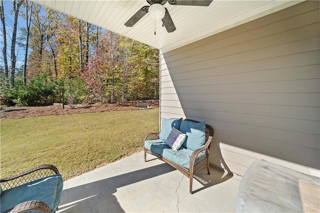 view of patio featuring ceiling fan