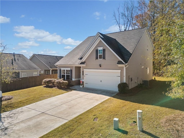 view of front facade featuring central air condition unit, a front lawn, and a garage