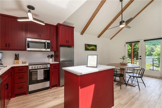 834 Lower Bell Creek Rd, Hiawassee, GA 30546 - kitchen featuring appliances with stainless steel finishes, a ceiling fan, high vaulted ceiling, tasteful backsplash, and reddish brown cabinets
