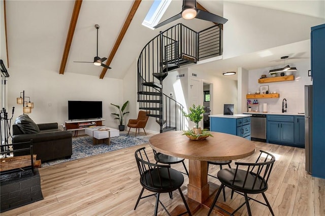 834 Lower Bell Creek Rd, Hiawassee, GA 30546 - dining room featuring high vaulted ceiling, a ceiling fan, light wood-style flooring, stairs, and beam ceiling