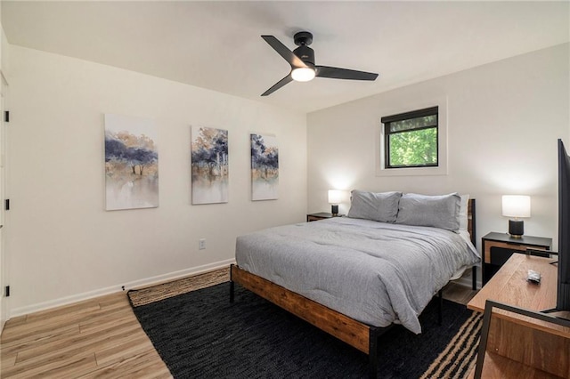 834 Lower Bell Creek Rd, Hiawassee, GA 30546 - bedroom with light wood-style floors and a ceiling fan