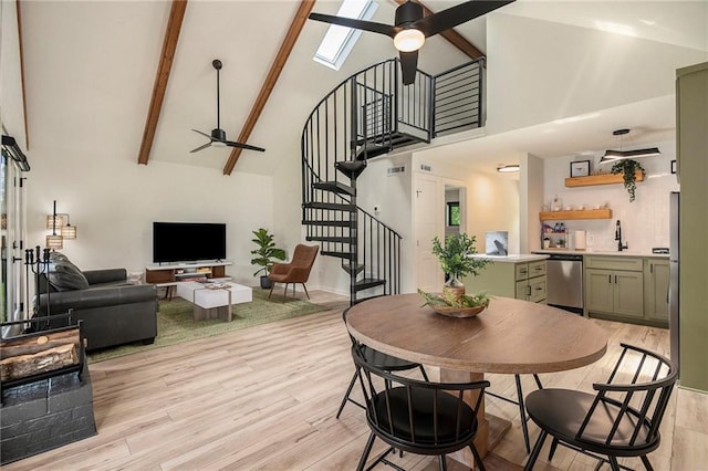834 Lower Bell Creek Rd, Hiawassee, GA 30546 - dining space with a ceiling fan, stairway, high vaulted ceiling, light wood finished floors, and beam ceiling