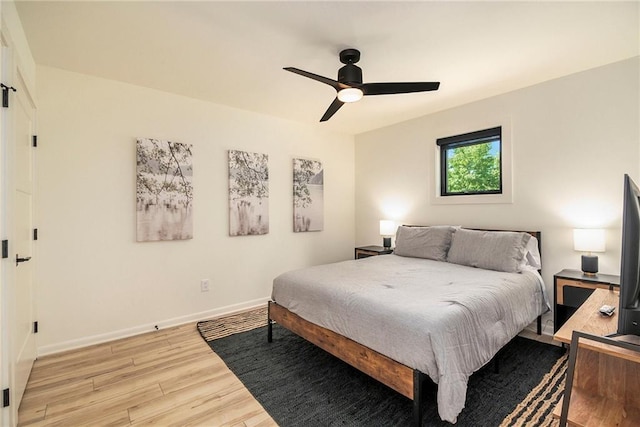 834 Lower Bell Creek Rd, Hiawassee, GA 30546 - bedroom with light wood-style floors and ceiling fan