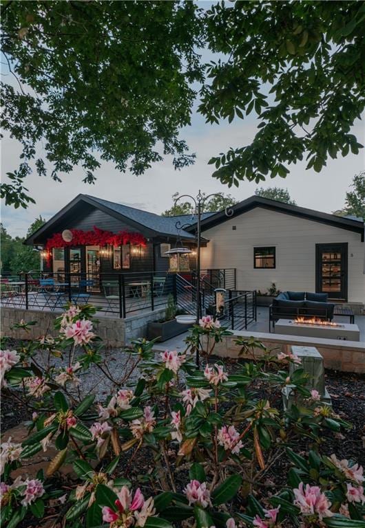 834 Lower Bell Creek Rd, Hiawassee, GA 30546 - rear view of house with a deck and outdoor lounge area