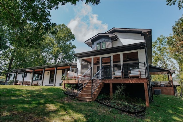 834 Lower Bell Creek Rd, Hiawassee, GA 30546 - rear view of property featuring ceiling fan, a yard, and stairs