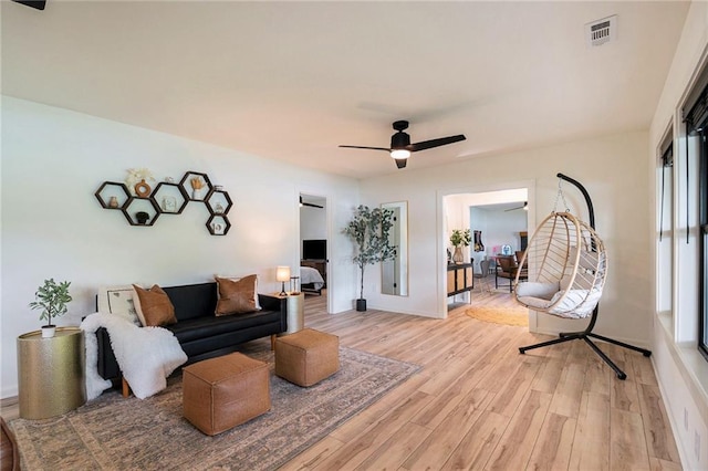 834 Lower Bell Creek Rd, Hiawassee, GA 30546 - living area featuring light wood finished floors and a ceiling fan