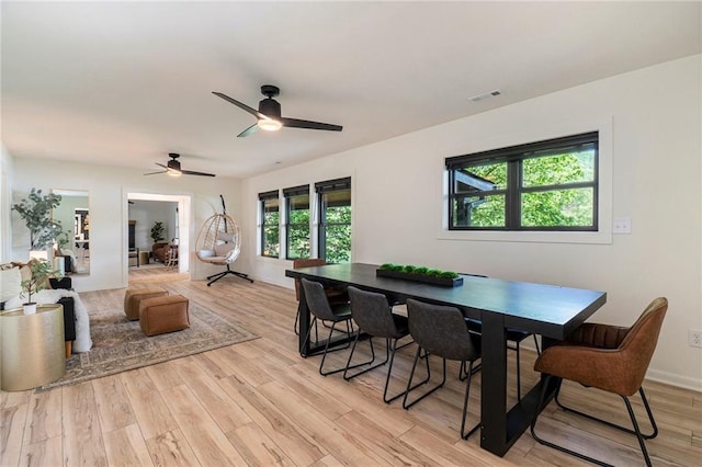 834 Lower Bell Creek Rd, Hiawassee, GA 30546 - dining space with light wood finished floors and ceiling fan