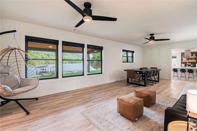 834 Lower Bell Creek Rd, Hiawassee, GA 30546 - living room with a ceiling fan and wood finished floors