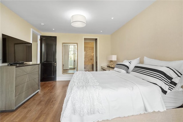 bedroom featuring hardwood / wood-style flooring