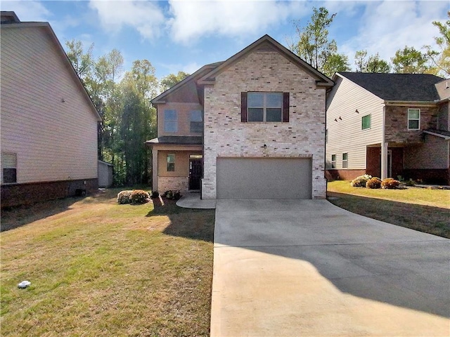 view of front of home featuring a front yard and a garage