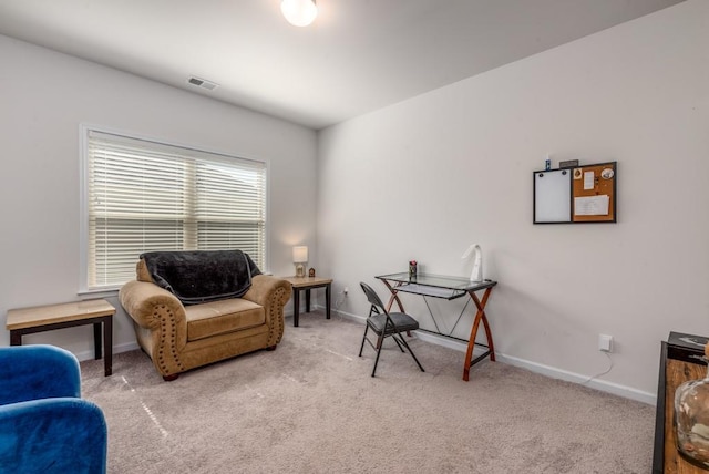 sitting room featuring carpet, visible vents, and baseboards