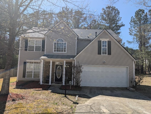 3967 Moos Creek Ct, Loganville, GA 30052 - traditional-style house featuring concrete driveway and a garage