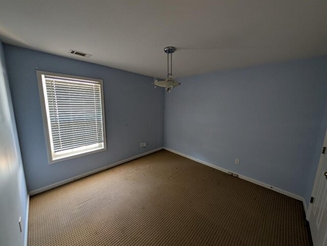 3967 Moos Creek Ct, Loganville, GA 30052 - spare room with carpet, visible vents, and baseboards