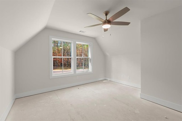 additional living space featuring ceiling fan and lofted ceiling