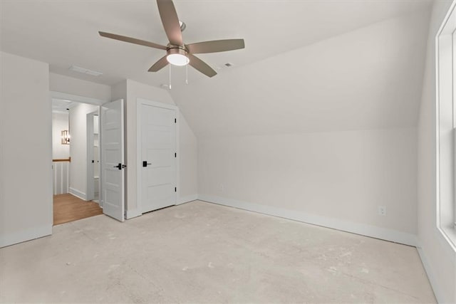 bonus room with ceiling fan and lofted ceiling