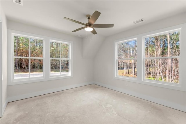 empty room featuring ceiling fan and a healthy amount of sunlight