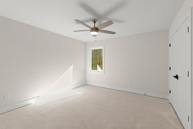 spare room featuring ceiling fan