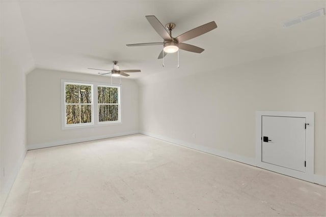 unfurnished room featuring ceiling fan and lofted ceiling