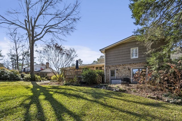 view of yard with a deck