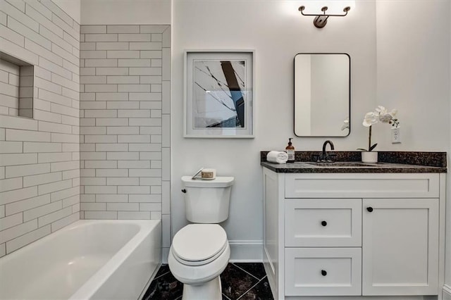 full bathroom featuring tiled shower / bath, vanity, and toilet