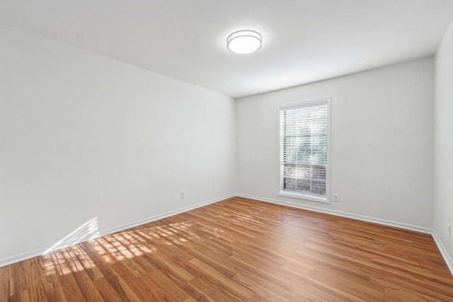 6851 Roswell Rd Unit N-20, Sandy Springs, GA 30328 - unfurnished room with baseboards and light wood-style floors