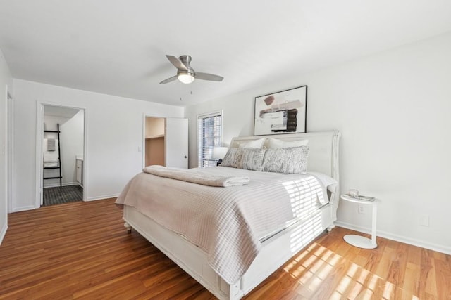 6851 Roswell Rd Unit N-20, Sandy Springs, GA 30328 - bedroom with wood finished floors, baseboards, a ceiling fan, and ensuite bath