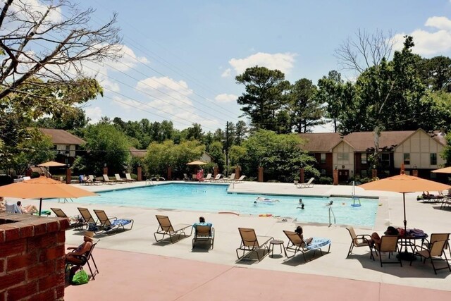 6851 Roswell Rd Unit N-20, Sandy Springs, GA 30328 - community pool with a patio area