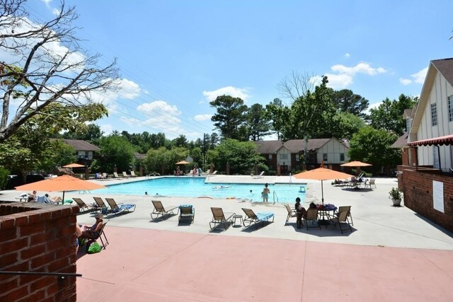 6851 Roswell Rd Unit N-20, Sandy Springs, GA 30328 - community pool with a patio
