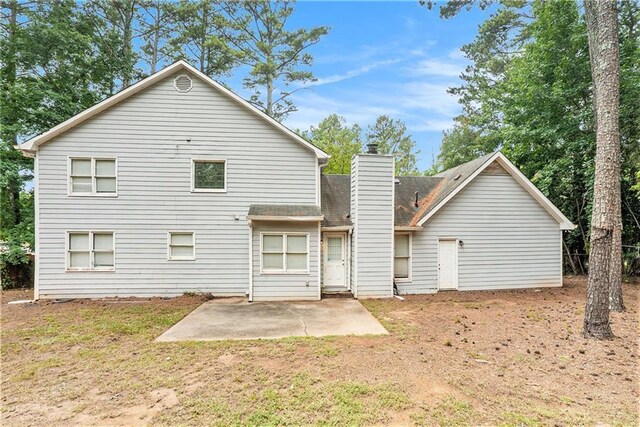 rear view of house with a patio area