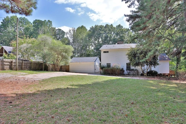 view of home's exterior featuring a yard and a garage