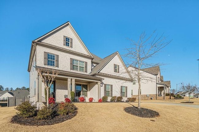 view of front of home featuring a front lawn