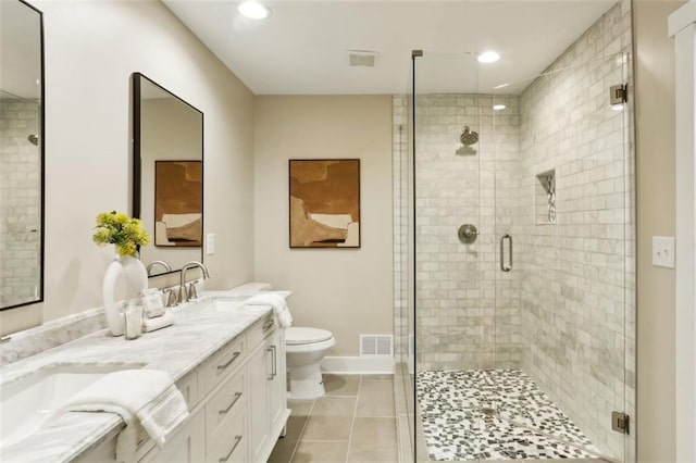 645 Trailmore Pl, Roswell, GA 30076 - full bathroom with toilet, a sink, a shower stall, tile patterned flooring, and visible vents