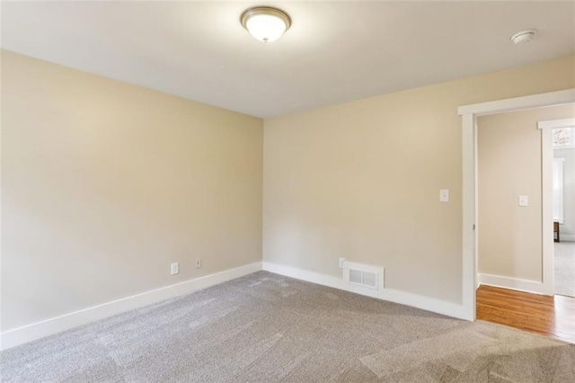 645 Trailmore Pl, Roswell, GA 30076 - unfurnished room with carpet floors, baseboards, and visible vents