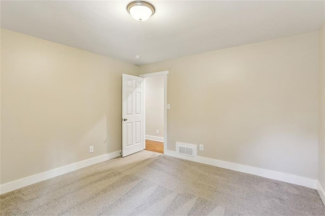 645 Trailmore Pl, Roswell, GA 30076 - empty room with carpet floors, baseboards, and visible vents