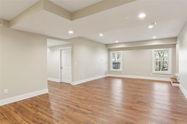 645 Trailmore Pl, Roswell, GA 30076 - unfurnished living room with recessed lighting, baseboards, and wood finished floors