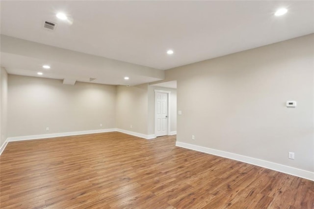 645 Trailmore Pl, Roswell, GA 30076 - spare room with light wood finished floors, baseboards, visible vents, and recessed lighting