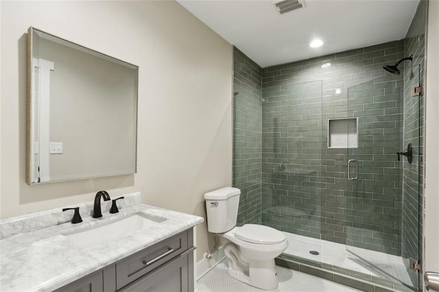 645 Trailmore Pl, Roswell, GA 30076 - full bathroom featuring visible vents, toilet, tile patterned floors, vanity, and a stall shower