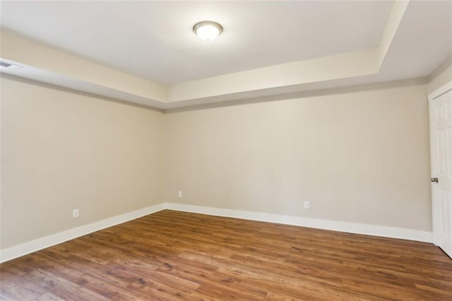 645 Trailmore Pl, Roswell, GA 30076 - empty room featuring baseboards, visible vents, and wood finished floors