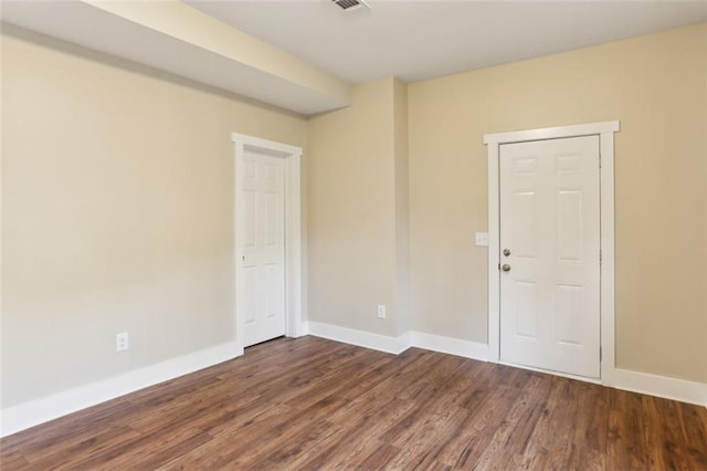 645 Trailmore Pl, Roswell, GA 30076 - empty room with baseboards, dark wood-style flooring, and visible vents
