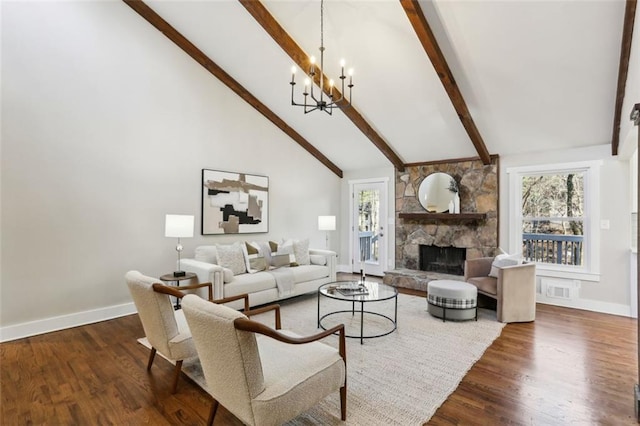 645 Trailmore Pl, Roswell, GA 30076 - living area with a stone fireplace, high vaulted ceiling, a notable chandelier, and dark wood-type flooring
