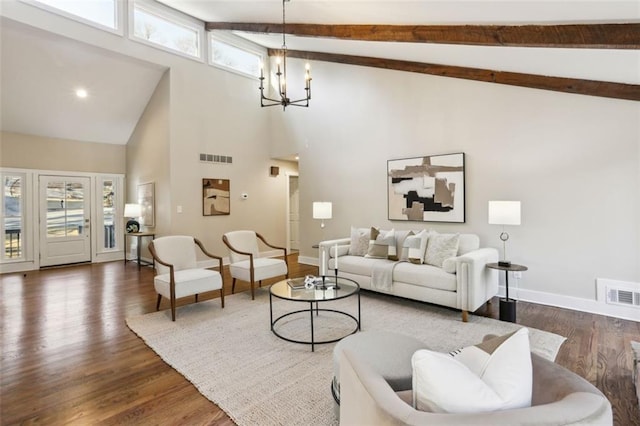 645 Trailmore Pl, Roswell, GA 30076 - living area featuring dark wood-style flooring, lofted ceiling with beams, baseboards, and visible vents