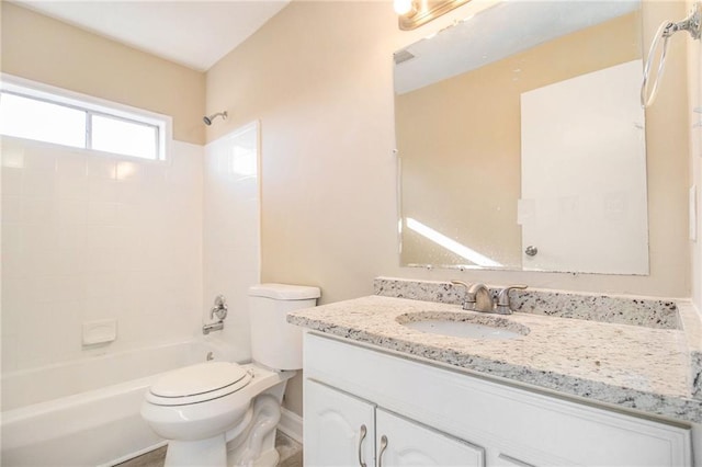 full bathroom with vanity,  shower combination, and toilet