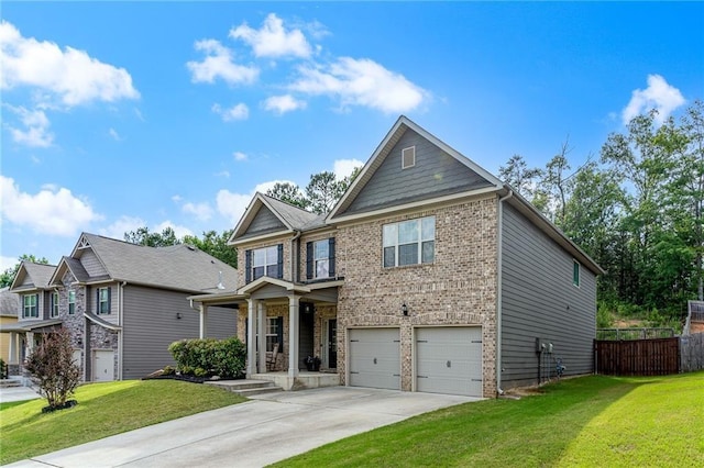 view of front of house with a front yard and a garage