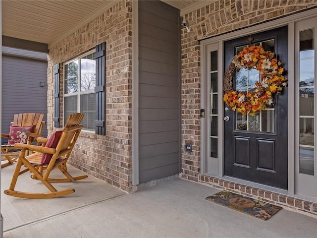 entrance to property with covered porch