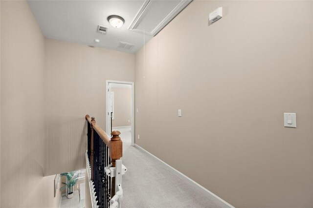 2303 Waters Edge Trl, Roswell, GA 30075 - hall featuring attic access, carpet, baseboards, and an upstairs landing