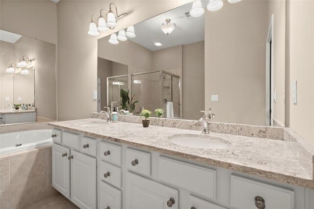 2303 Waters Edge Trl, Roswell, GA 30075 - bathroom featuring a stall shower, a bath, double vanity, and tile patterned floors