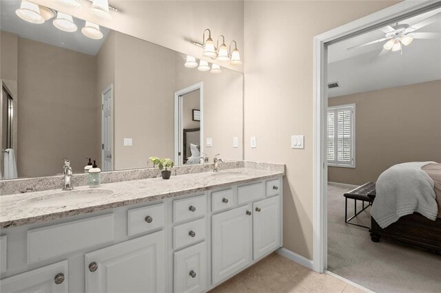 2303 Waters Edge Trl, Roswell, GA 30075 - ensuite bathroom featuring double vanity, baseboards, tile patterned floors, and a ceiling fan