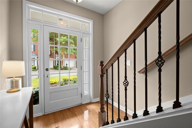 2303 Waters Edge Trl, Roswell, GA 30075 - foyer with plenty of natural light, stairs, and light wood-style floors