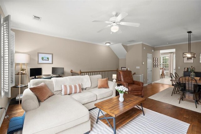 2303 Waters Edge Trl, Roswell, GA 30075 - living room featuring wood finished floors, ceiling fan, ornamental molding, and baseboards