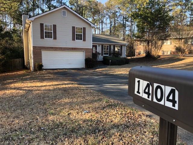 split level home with a garage